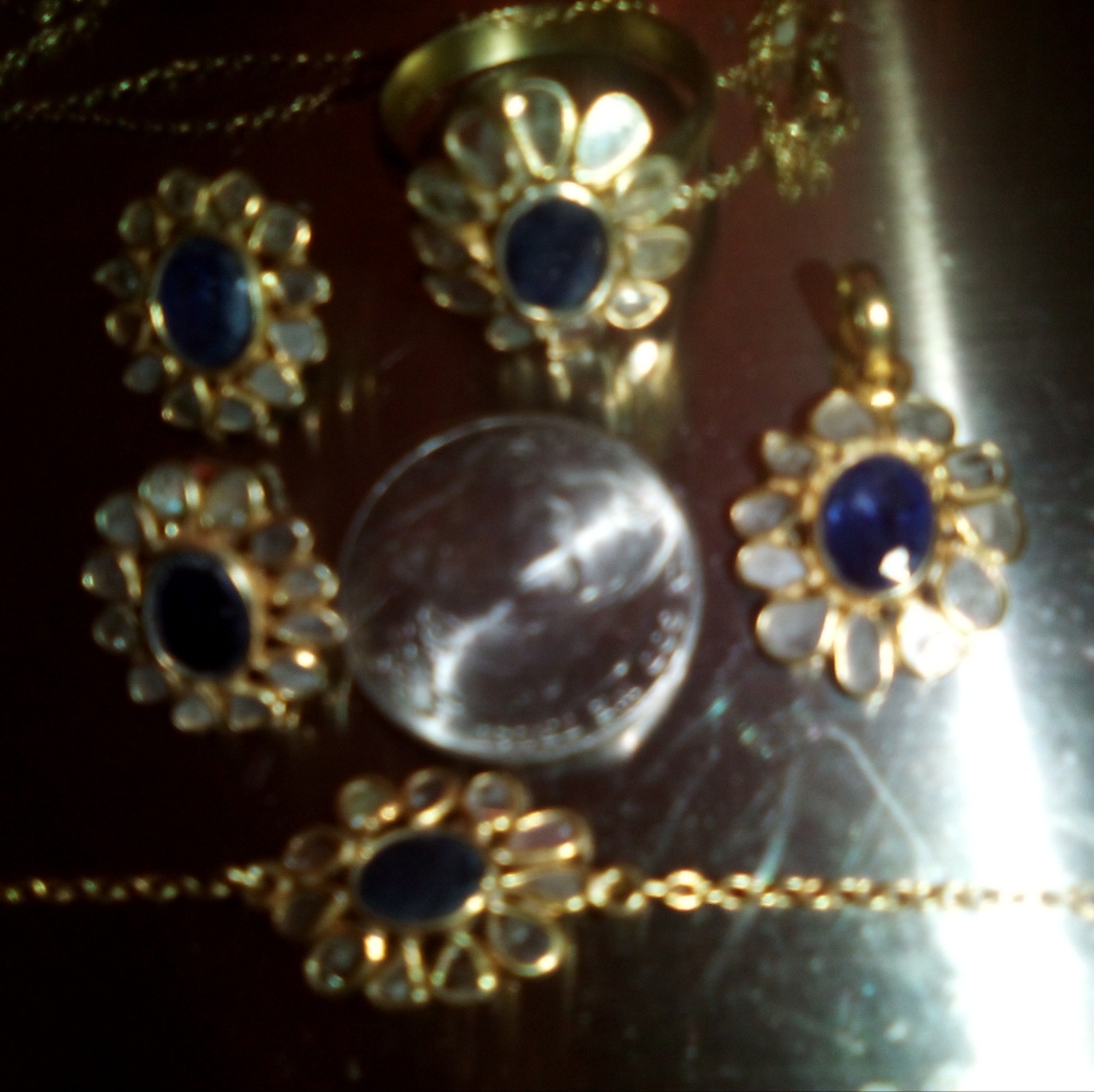 Gold, sapphire diamond ring, bracelet, pendant and earrings set